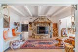 Original fireplace made with granite from the property + vintage Turkish rug