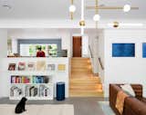 The home's living room that opens up into its mid-century-modern kitchen.