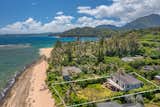 The lot of The Butterfly House sits beachfront along Kauai's famed North Shore