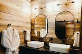 Scandinavian spa inspired bathroom retreat with dual sinks.