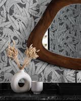 The Powder washroom. We wanted something bold and fun for the powder washroom. We fell in love with the textured monkey wallpaper. 