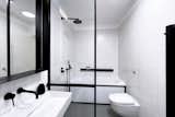 Bath Room, Linoleum Floor, Ceramic Tile Wall, One Piece Toilet, Wall Mount Sink, Ceiling Lighting, Open Shower, and Soaking Tub Bathroom  Photo 10 of 18 in BJM Apartment by B2 Architecture / Barbara Bencova