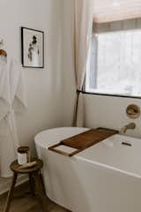Large soaking tub with lavender bath salts provided for guests.