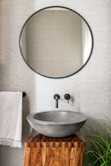 Bath Room, Wood Counter, Vessel Sink, and Accent Lighting The pedestal sink in the powder bath.  Photo 16 of 20 in Catamaran House by Lear Studio Architects