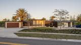 Exterior, Hipped RoofLine, Metal Roof Material, House Building Type, Flat RoofLine, Stucco Siding Material, Stone Siding Material, Metal Siding Material, and Wood Siding Material Front Facade  Photo 2 of 16 in Lear Residence by Lear Studio Architects