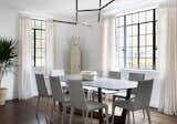 Dining Room, Chair, Lamps, Pendant Lighting, Table, and Medium Hardwood Floor Dining Room by Mary Patton Design  Photo 7 of 13 in The Bluebonnet Residence by Luke Will