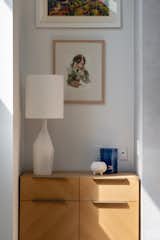 Recessed niche within the fireplace wall for display and storage.