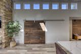 North window wall with barn door