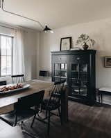 Dining Room, Chair, Medium Hardwood Floor, and Table Lighting  Photo 8 of 10 in The Moody Home by Photographie Intérieure CO.