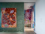 Custom artwork by a local artist defines the vestibule as a space with its own experience.