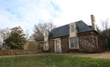 Exterior, House Building Type, Mansard RoofLine, Shingles Roof Material, and Stone Siding Material Guest House  Photo 10 of 10 in Le Château "Tocqueville" by Carsten Sprotte