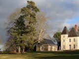 Exterior, House Building Type, Mansard RoofLine, Stone Siding Material, and Shingles Roof Material Château and guest house  Photo 10 of 10 in Modern artist reinvents classic Loire-Valley château by Carsten Sprotte