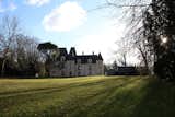 Exterior, House Building Type, Gable RoofLine, Stone Siding Material, and Shingles Roof Material Château (view from river)  Photo 9 of 10 in Modern artist reinvents classic Loire-Valley château by Carsten Sprotte