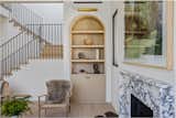 Built-in shelf nook next to the living fireplace