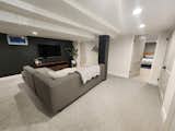 The refinished basement den plus a look into a guest room