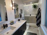 Master ensuite with soffit and under vanity lighting
