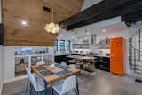 Kitchen and dining area. The kitchen was designed around the orange Smeg fridge