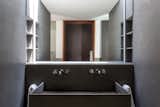 Bath Room, Concrete Floor, Concrete Wall, Concrete Counter, and Granite Counter  Photo 20 of 24 in ACP House by Candida Tabet Arquitetura