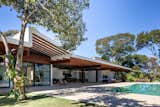 Outdoor, Concrete Patio, Porch, Deck, Large Pools, Tubs, Shower, Trees, Gardens, Large Patio, Porch, Deck, Grass, and Back Yard  Photo 2 of 26 in Gaya House by Candida Tabet Arquitetura