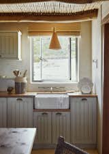 Kitchen, Wood Counter, Wood Cabinet, Concrete Floor, Drop In Sink, and Pendant Lighting Kitchen  Photo 4 of 23 in Varswaterbaai by Charlotte