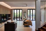 Living Room, Sofa, Recessed Lighting, Ceiling Lighting, and Ceramic Tile Floor  Photo 7 of 36 in Tropical Living by Provolk Architects