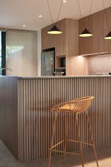 Dining Room, Chair, Wall Lighting, Bar, and Ceramic Tile Floor  Photo 9 of 36 in Tropical Living by Provolk Architects