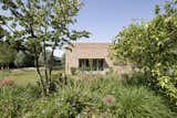 Exterior, Tile Roof Material, Shed Building Type, Shed RoofLine, and Brick Siding Material The large opening to the garden  Photo 3 of 11 in Studio Shed by LMNL office for architecture and landscape