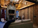Interior view of the cabin and reclaimed barn wood wall