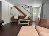 Living room with full size sofa bed. 