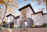 Rear Elevation capturing the clean lines of stucco, stone and imported German windows
