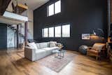 Living Room, Medium Hardwood Floor, Ceiling Lighting, and Sofa  Photo 7 of 22 in Belivo loft + 3 rental units by Alexis Belliveau