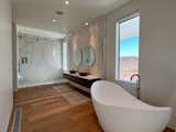 Bath Room and Medium Hardwood Floor  Photo 7 of 8 in Calico Basin Dream Home by Ryan Pardey