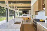 View of kitchen and living spaces beyond