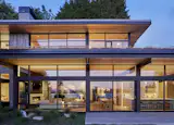 View of glass wall into living spaces 