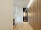 View on the corridor leading to the kitchen of suite 201  Photo 4 of 13 in La Suite 201 by Pseudonyme Architecture