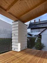 Exterior, Wood Siding Material, Shed RoofLine, Metal Roof Material, Stucco Siding Material, and House Building Type  Photo 10 of 29 in House in the Courtyard by IGLOO ARCHITEKTI