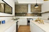 Effervescently bright kitchen with ample room.