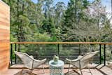 Home nestles into the natural flora of the area with extensive views of the California redwood and oak trees.