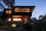 Exterior, Wood Siding Material, Metal Roof Material, Flat RoofLine, and House Building Type The East (street) facade  Photo 14 of 21 in The Balmoral Beach House by Queen Mab Design Studio