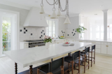 Kitchen, Cooktops, Ceramic Tile Backsplashe, Light Hardwood Floor, and Pendant Lighting  Photo 6 of 10 in The Summer House by Carrie Myers