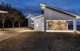 Exterior, Farmhouse Building Type, A-Frame RoofLine, Metal Roof Material, and Metal Siding Material Entry and courtyard area   Photo 7 of 14 in G6 Ranch outside of Houston, TX by George lemaire