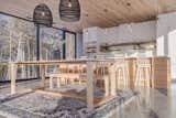 Dining room & kitchen  Photo 16 of 44 in The Scandinavian on a Pond by Construction Memphré