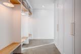 Built-in benches and wardrobes in the entryway 