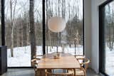 Dining Room  Photo 2 of 50 in In Quebec, a Pair of Black Gables Form a Scandinavian-Inspired Cabin by Construction Memphré