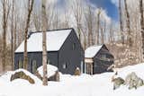  Photo 1 of 50 in In Quebec, a Pair of Black Gables Form a Scandinavian-Inspired Cabin by Construction Memphré