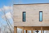 Exterior, Flat RoofLine, Wood Siding Material, and House Building Type  Photo 4 of 34 in The bi-generational home by the mountain by Construction Memphré