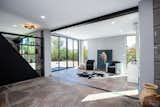 Floor to ceiling windows allow for indoor/outdoor living.