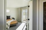 Double doors from entry lead into the primary suite