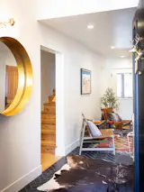 Entrance, Interior. AFTER- RH leather chairs, Kohler Lighting, Signature Hardware Accessories, Original 3D Mammoth Lakes map by South Lake Tahoe woodworking Studio 3D Wood Maps.