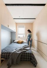 Bedroom, Lamps, Bed, Wall Lighting, Storage, Ceiling Lighting, and Porcelain Tile Floor  Photo 4 of 23 in BEYOME Lavapiés by Enorme Studio